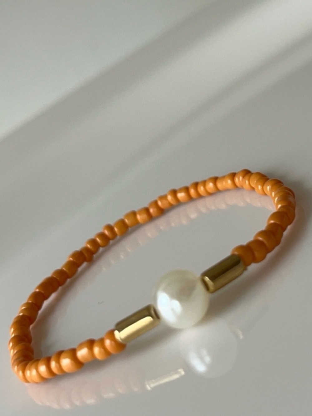Classic Orange Beaded Stretch Bracelet with Pearl Accent